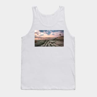 Lighthouse on a rocky beach Tank Top